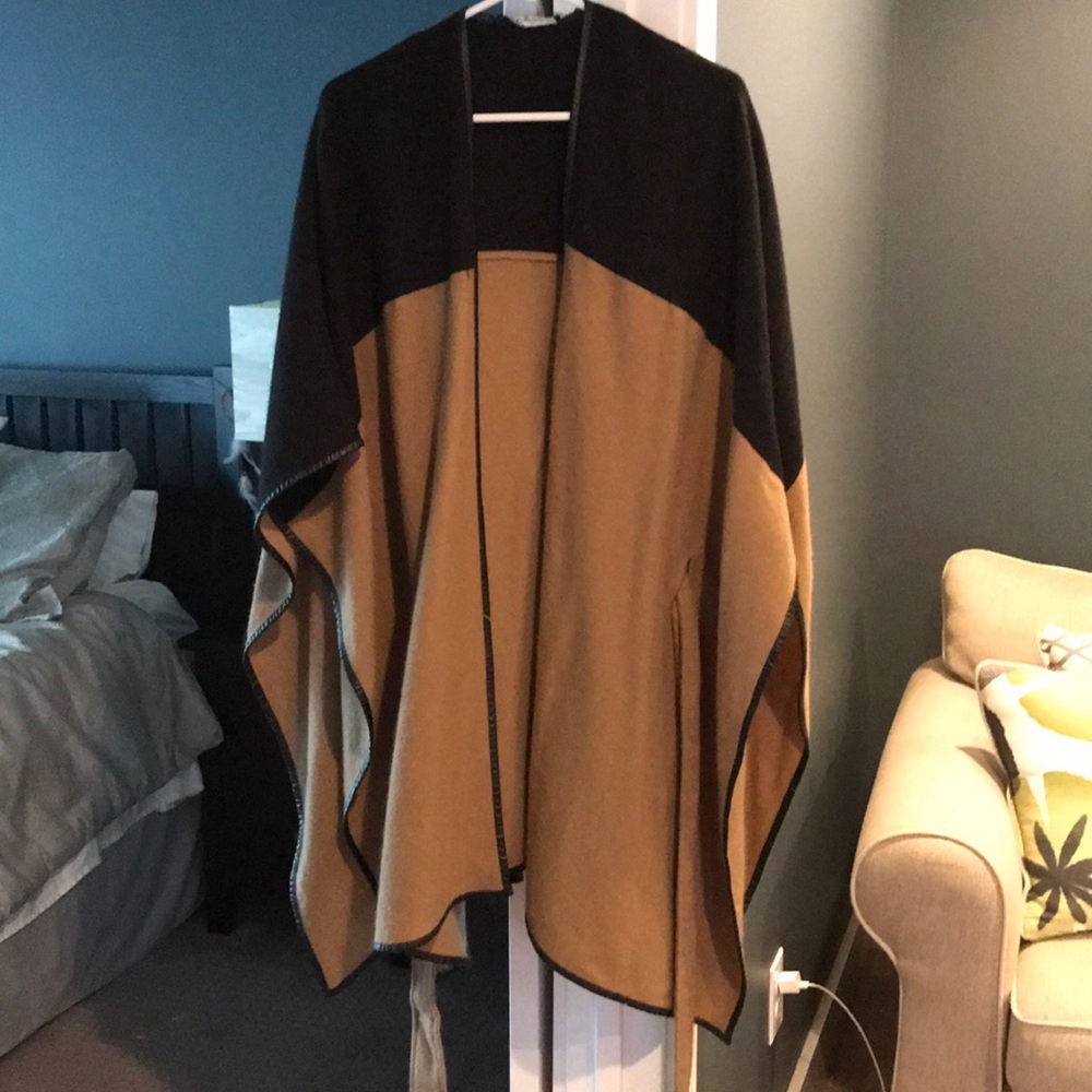 Tan and black sweater poncho